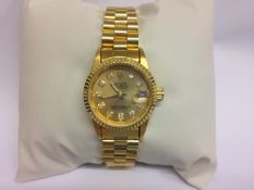 Ladies Watch, states Rolex perpetual date.