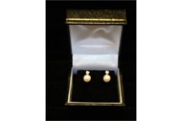 1  x Pair of 9 Carat White gold pearl and diamond stud earrings. Total RRP £129. Beautiful elegant