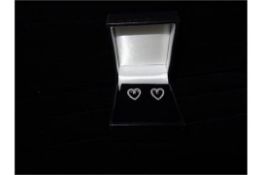 1 x Pair of 9 Carat White Gold Diamond Heart Stud Earrings. Origional manufacturers RRP £125!