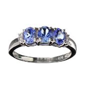 3x Tanzanite Gemstones (1.25ct) & 4x Colourless Quartz (0.60ct), Platinum Over Silver Ring Size N-O.