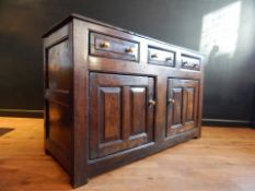 WELSH LOW CUPBOARD DRESSER CIRCA 1720. Low oak cupboard dresser.