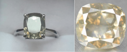 4.06 carat Fancy coloured diamond in a solitair setting of 18k sold olid white gold.