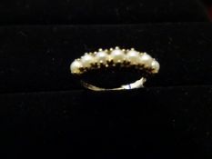 9 Carat Yellow Gold Ladies Ring, with 7 Pearl looking stones, Very nice looking piece! High