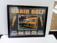 Usain Bolt signed world 100 mtr record photo montage - Size 27 x 33 inches - Estimated value £130-£