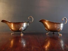 PAIR SILVER SAUCE BOATS. Condition: 1 minor pen point dent. 5″ long