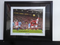 Manchester United's Wayne Rooney  signed photo of his overhead kick against local rivals Man