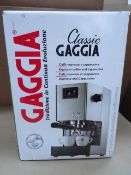 1 x Gaggia Classic Espresso Machine - Brushed Stainless Steel. 
The Gaggia Classic is one of the