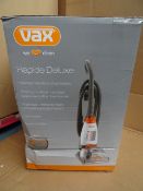1 x Vax V-026RD Rapid Deluze Wet and Dry Vacuum. Light weight, washes carpets and upholstery,