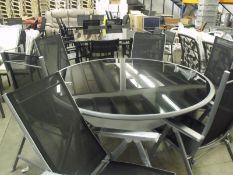 7 piece patio set: 6x fold up reclining chairs / 1x 1500mm round table with black glass top