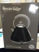 Swan Retro Pyramid Kettle, 2 Litre, Black   Cordless design with 360 degree base
Automatic cut
