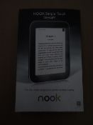 2 x Nook Simpletouch glowlight e-reader. 'Glowlight the brightest innovation in reading. 6 inch e
