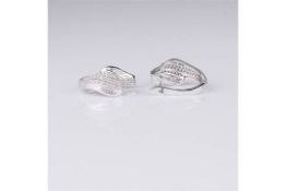 An attractive 0.42 carat Mixed Cut 90 Diamonds And Rhodium Over Silver Earrings  appraised by