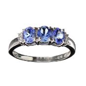 3 x Tanzanite Gemstones = 1.25 carat And 4 x Colourless Quartz =0.60 carat Platinum Over Silver