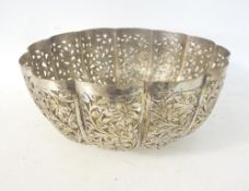 wiIndian White Metal Centre Bowl of shaped form
with pierced leaf decoration  37cms wideth pierced