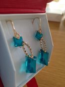 34.98 ct Paraiba Tourmaline, black and white Diamond dangle earrings, 14 ct gold setting