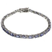 4.75ct Tanzanite / Topaz stones on Platinum Over Silver Bracelet. Appraised at $5,650 approx £3,778