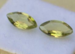 1.79ct Pair of Matched Marquise cut Peridot. Gem valuation index for March 2015 $70.25 approx £47.02