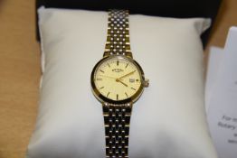 Yellow metal Ladies Rotary Date Face Circular Bracelet Strap Watch with box and certificate.