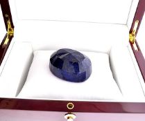 A large Oval Cut Blue Sapphire Gemstone 697.05 carat. Appraisal value $24,396.00 approx £16,421.03