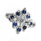 8x Blue Sapphires 0.40ct & 1x Topaz 0.15ct Platinum over Silver Ring. Appraised at $750 approx £503