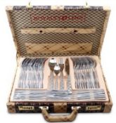 A 72 piece Stainless Steel + Satin Cutlery Set in an imitation snakeskin Briefcase RRP £825.00