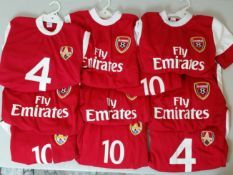 10 Sets Of  Red FOOTBALL T-SHIRTS With White SHORTS Sizes 26, 28