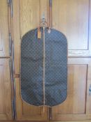 Authentic Louis Vuitton garment carrier.