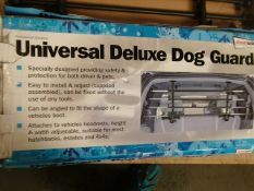 1pc - universal or Deluxe dog guard boxed - rrp £39.99.