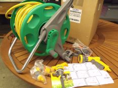 Brand New Wall Mounted Hozelock reel with 35m hose and attachments