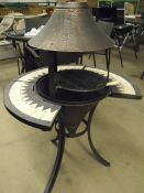 outdoor cast iron chiminea / barbecue with tiled mosaic finish, swing out grill plate, size 1120mm x