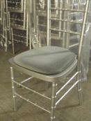 50 x silver chivari chairs with silver seat pads in very good condition