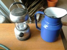camping light and enamel jug