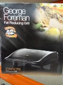 1 x George Foreman Fat Reducing Entertaining 7 Portion Grill. Removes upto 42% of fat! Cook your