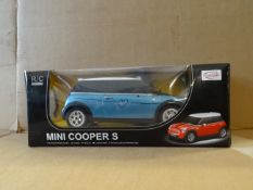 1 x Rastar Official Mini Cooper S Remote Control Car. Full Function radio control, forward and