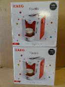 2 x AEG Favola LM5100 Lavaza Amodo Mio r. •Easily make espresso and espresso lungos with the touch