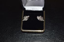 A beautiful 0.42Carat Mixed Cut (90) Diamonds/Rhodium Over Sterling Silver Earrings