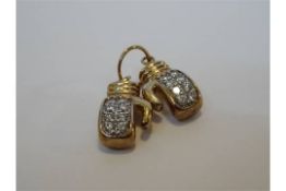 9 Carat Yellow Gold Pair of Boxing Gloves Pendant. Each glove comprises of 8 x clear stones (16