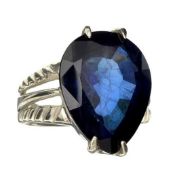 A Beautifully Sebastian designed Large 18.09 carat Pear Cut Blue Sapphire and  Silver Ring size O-P,