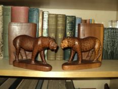 Nice pair of Leopard carved wooden book ends in good condition.