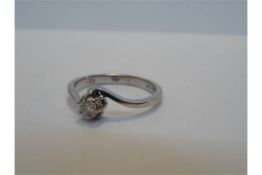 9 Carat White Gold Twist Style Solitaire Ring. Comrpising of 1 x 3.25mm round diamons. Approx 0.