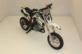 1 x Pocket Rocket Scrambler 49cc Mini Dirt Devil Motor Bike (White). Brand new and Boxed! Very