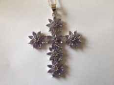 Pendant Cross
A stunning 4 carat mixed cut Tanzanite gemstones in a Platinum over silver pendant