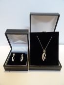 9 Carat Diamond Chain and Pendant & Earings Set. 18 Inch Chain with pendant comprising of 4 x 0.05mm