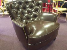 Large Deep Seated Designer Arm Chair
brand new and boxed 
Chocolate  Brown Faux Leather
Buttoned