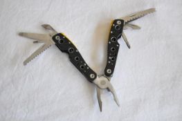 5 off 14 in 1 quality multitool. Aluminium handle with stainless steel tools. Includes: pliers, fish