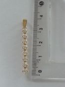 9 ct gold long pendant