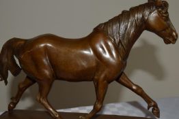 Prosper Lecourtier (1855-1924), French School, a bronze of a horse. Late 19th Century.