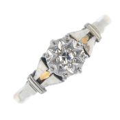 A single diamond ring set in platinum and 9 ct gold. Weight 1.8gms