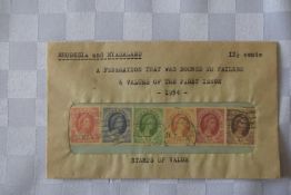 A collection of 6 Rhodesian & Nyasland stamps in a sealed envelope.