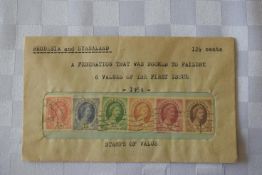 A collection of 6 Rhodesian & Nyasland stamps in a sealed envelope.
